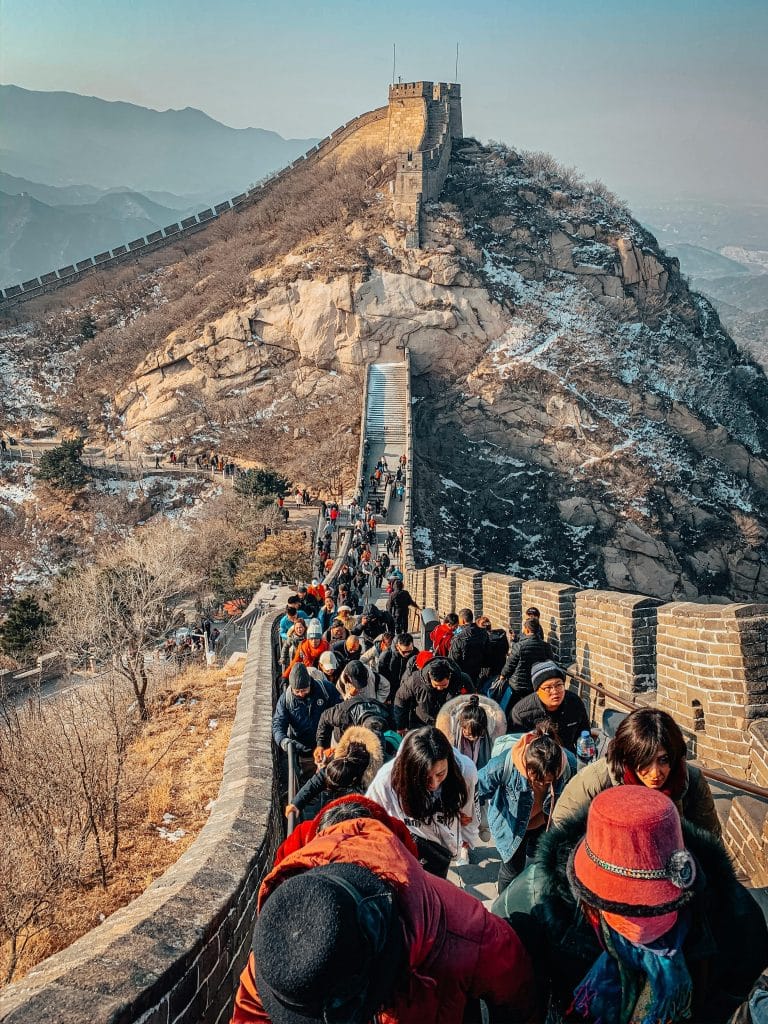 Scenic Spot Tourists exploring the Great Wall of China in Beijing, a UNESCO World Heritage Site, during winter.