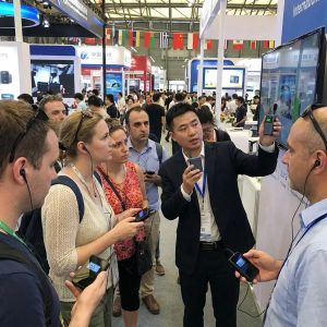 At the exhibition, tour guides use Yingmi tour guide system to provide commentary for visitors.