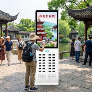 A tourist scan the qr code to rent the audio guide device.