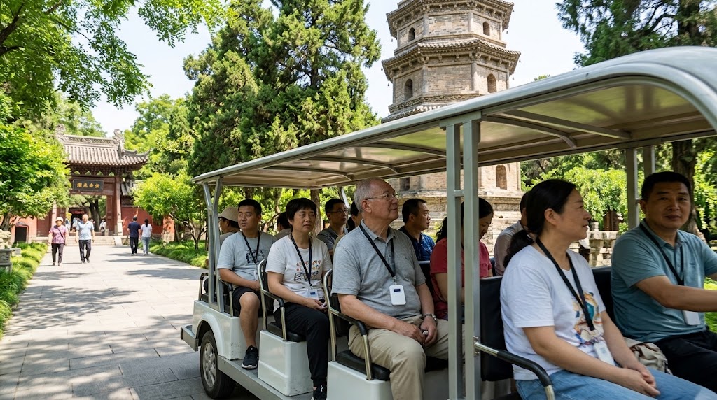 Passengers on an open-sided sightseeing tram wearing headphones